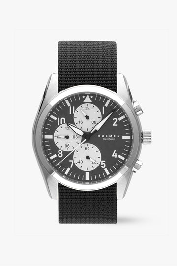 Black watch with a detailed face on a white background