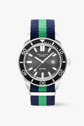 Watch with a black dial and blue and green striped strap on a white background