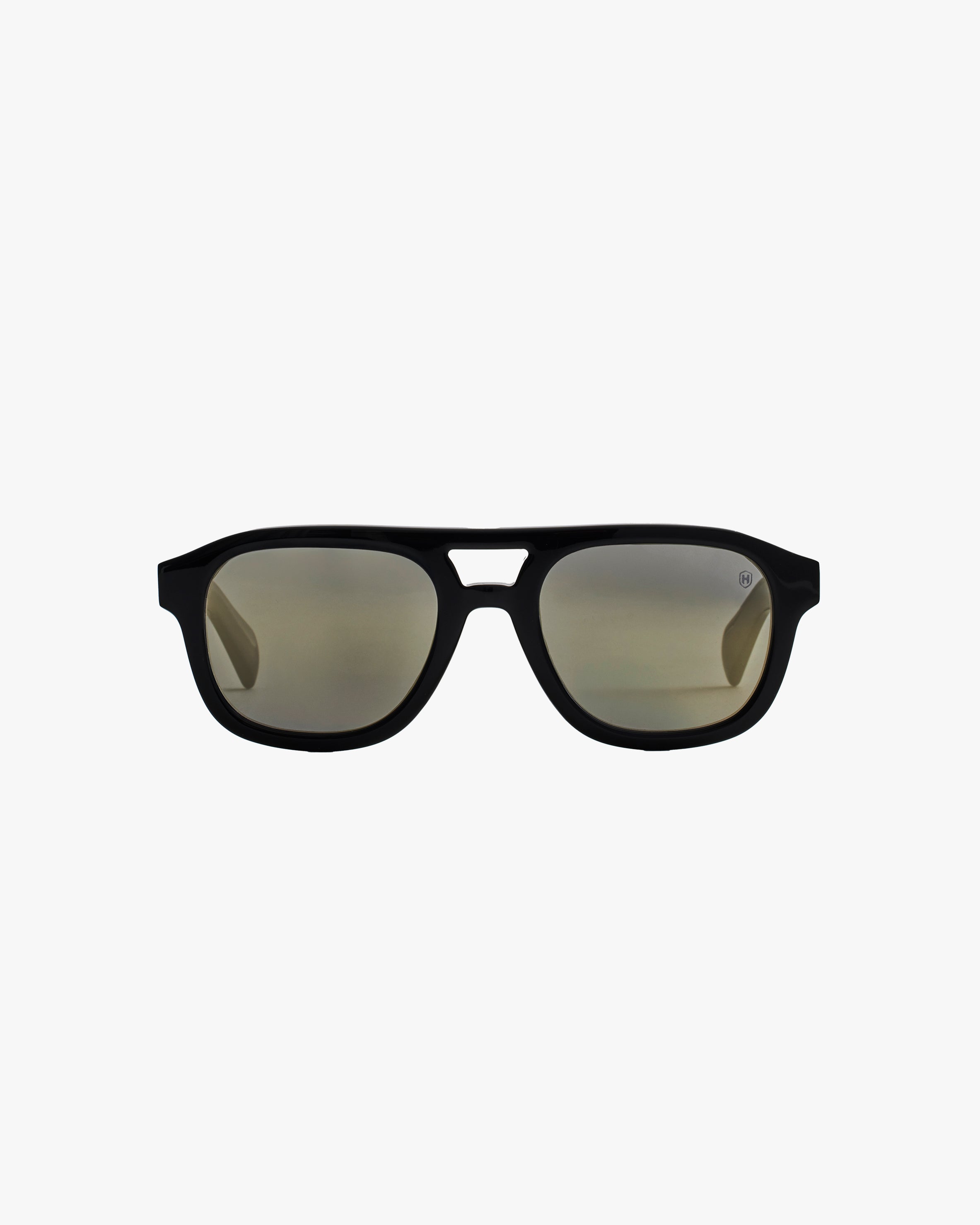 Black sunglasses with reflective lenses on a light grey background