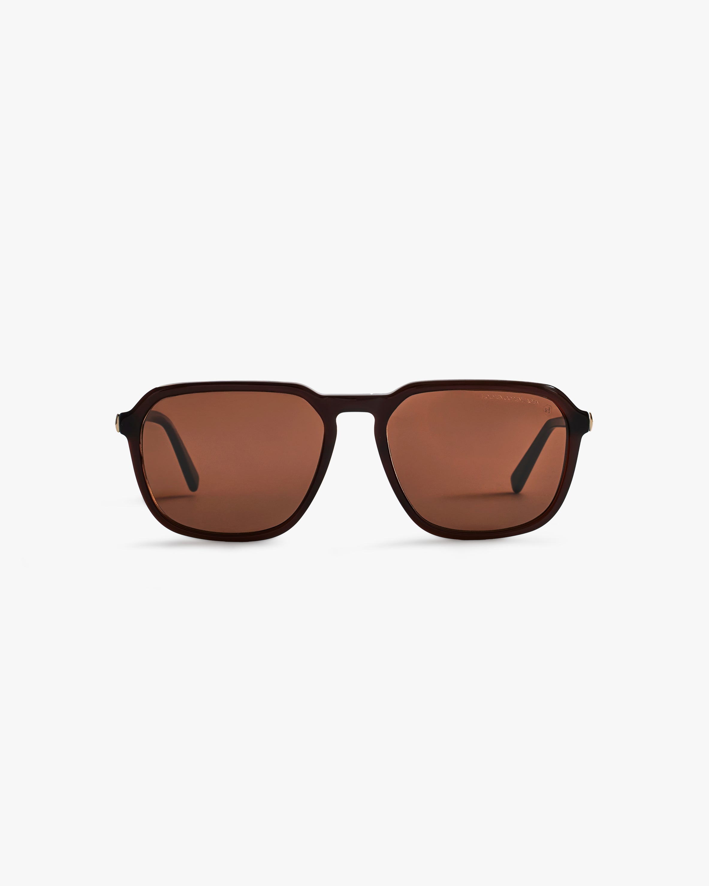 Brown sunglasses on a light grey background