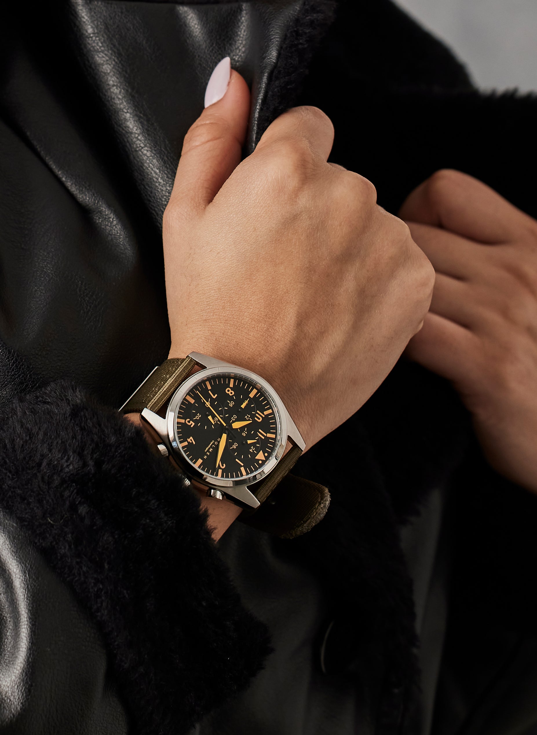 Adventurer watch 42mm black/orange dial with 2-piece khaki strap
